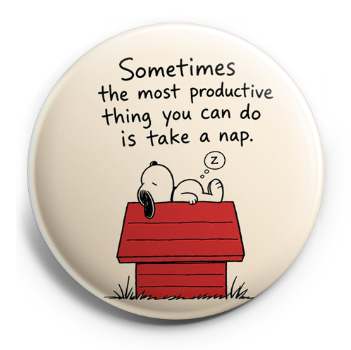 Snoopy taking a nap on his dog house. – Topper