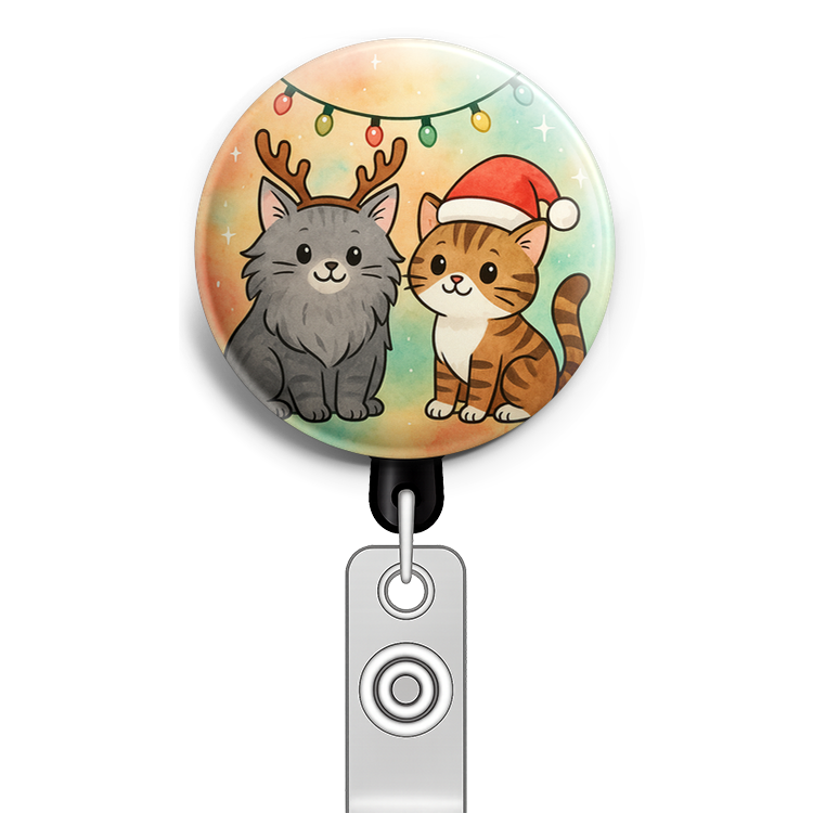 one cat in reindeer antlers and one in a Santa hat with Chri… - Badge Reel