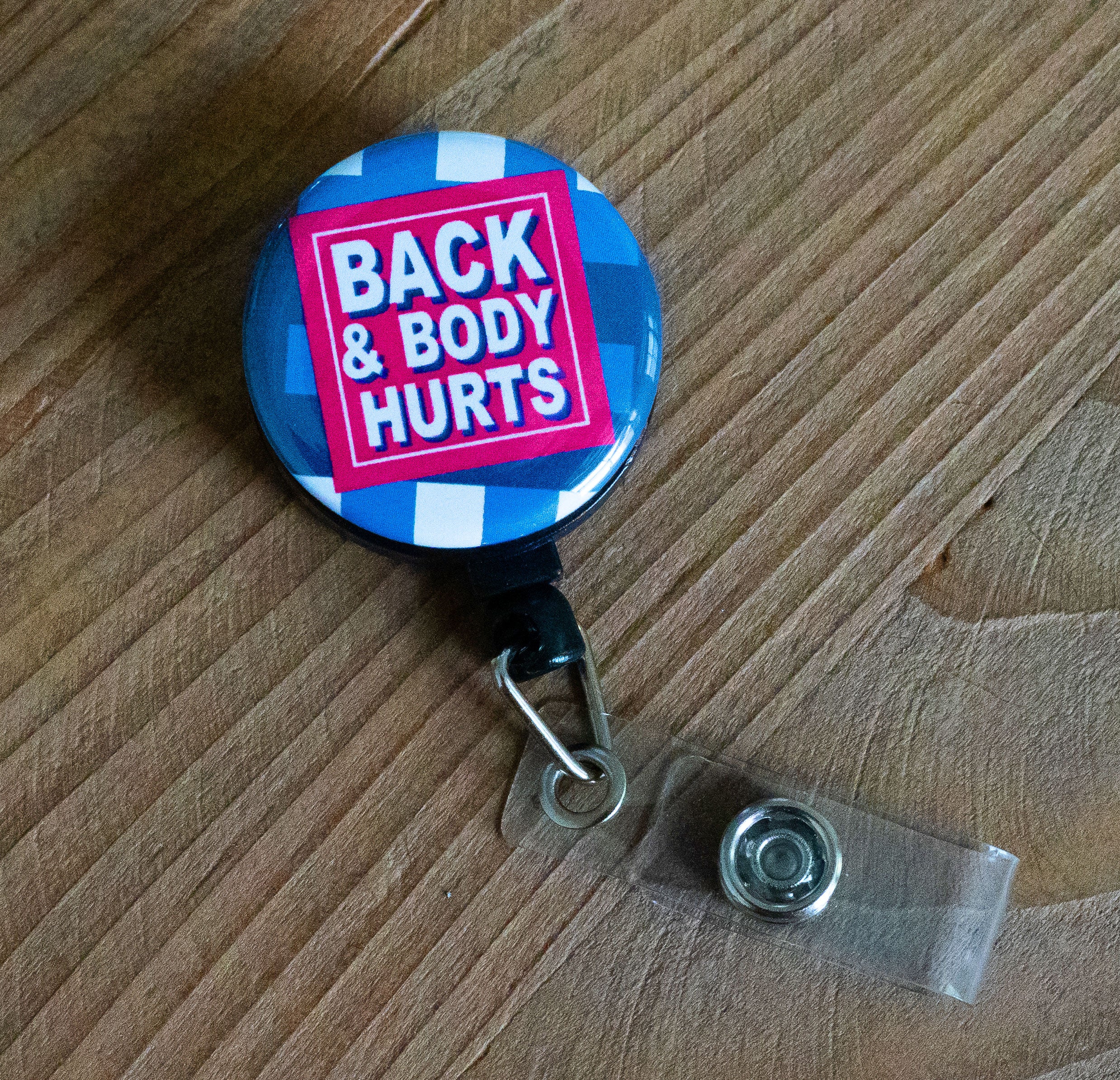 Back and Body Hurts Swapfinity Retractable ID Badge Reel - - Topperswap