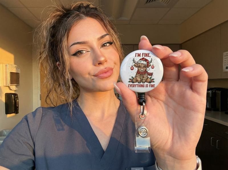 Festive Frenzy Warrior Pop Topper Swapfinity Retractable ID Badge Reel - worn by a nurse